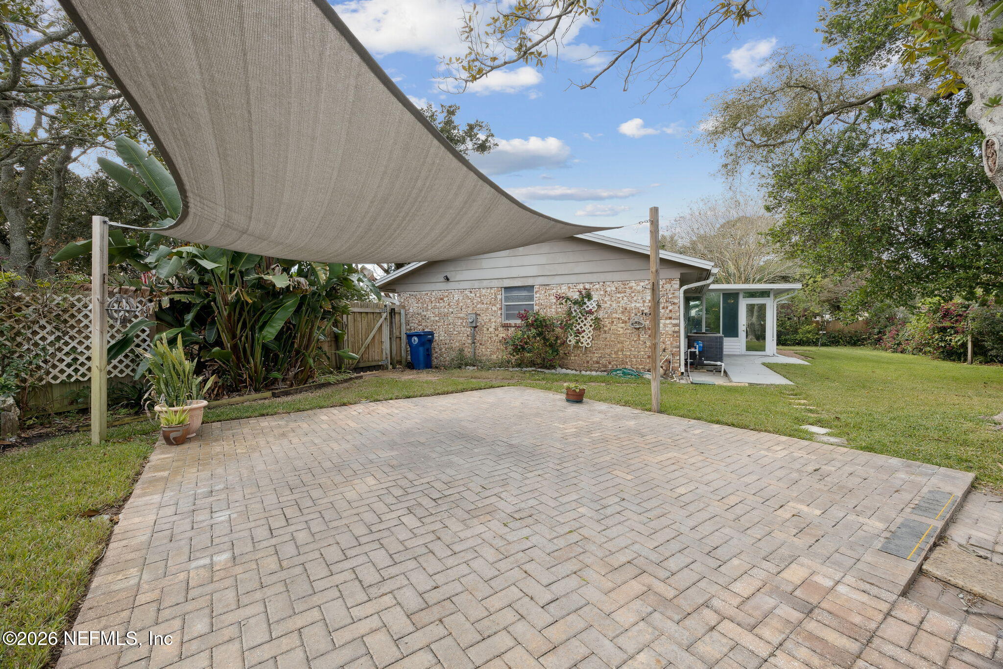 600 Davis Street Neptune Beach, FL 32266 - Photo 25 of 33 a view of a house with a yard