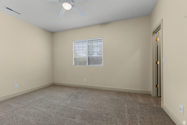 389 North Main Street St. George, UT 84770 - Photo 35 of 44 Carpeted empty room featuring ceiling fan and baseboards