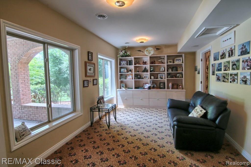 5185 Rector Court Bloomfield Hills, MI 48302 - Photo 28 of 33 Lower_Level_Living_Room.jpg