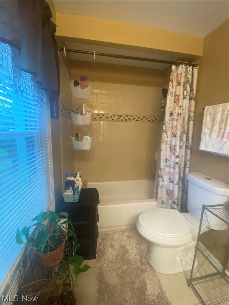 1500 Edgefield Road Lyndhurst, OH 44124 - Photo 13 of 24 Full Bathroom featuring toilet and shower / tub combo with curtain