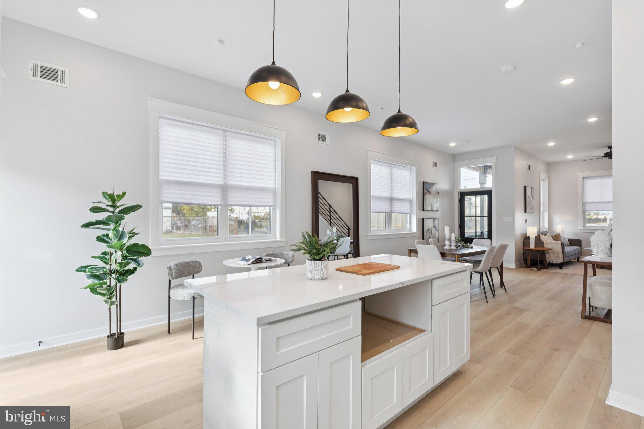 2800 Bridge Street Philadelphia, PA 19137 - Photo 11 of 51 a large kitchen with a table and chairs in it