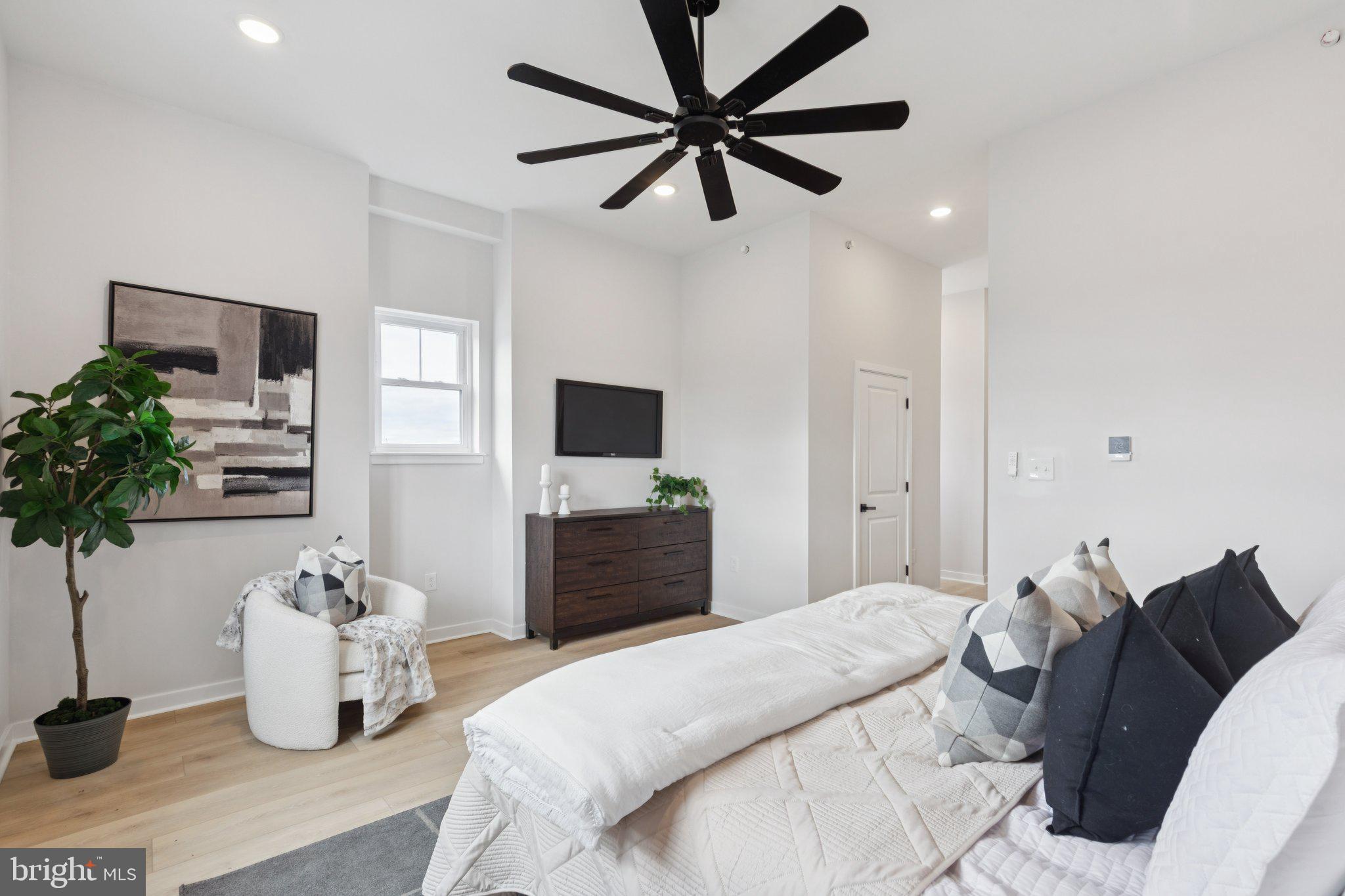 2800 Bridge Street Philadelphia, PA 19137 - Photo 48 of 51 a bedroom with a bed and a television