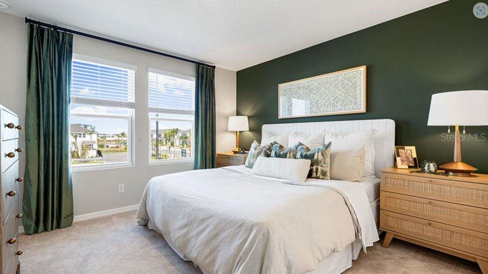 14064 Textile Run Parrish, FL 34219 - Photo 8 of 22 a bedroom with bed and window