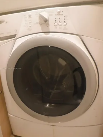 a view of a building with a yard