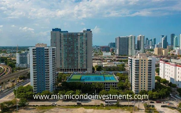 a view of a city with tall buildings