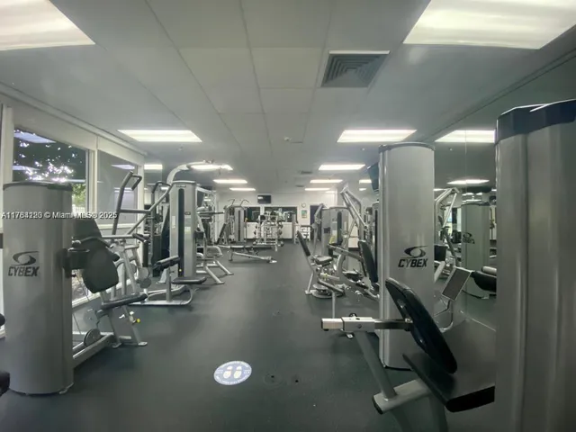 a view of backyard with seating and green space