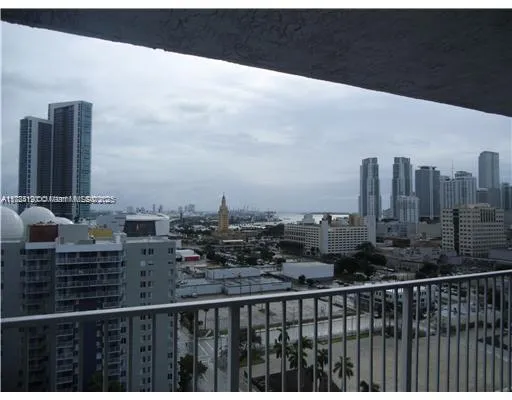 a view of a balcony with city view
