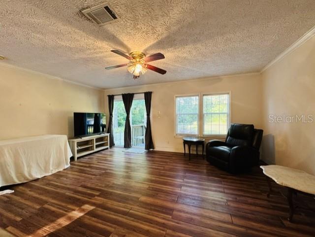 11817 Southwest 58th Street Webster, FL 33597 - Photo 4 of 46 a living room with furniture flat screen tv and wooden floor