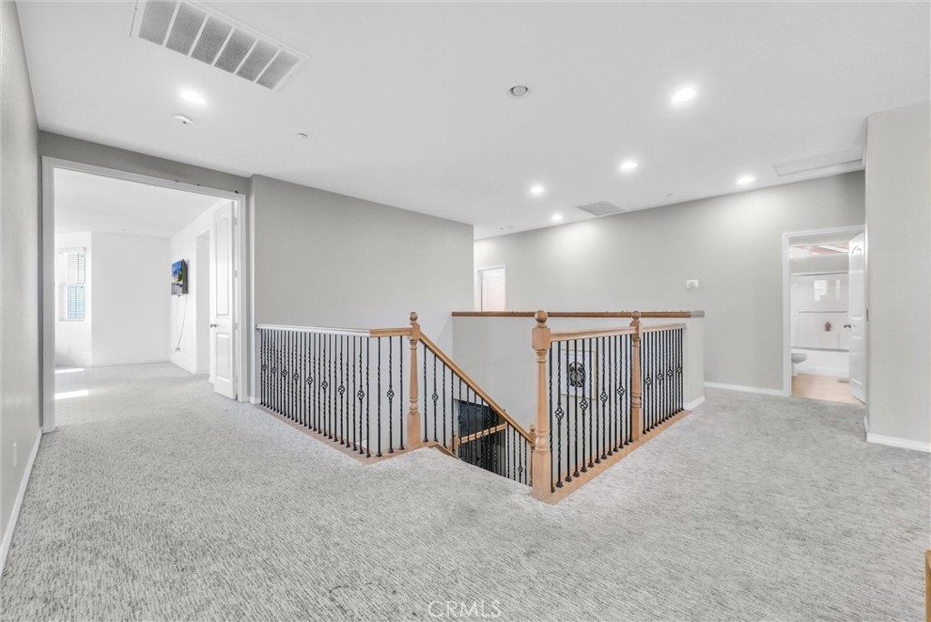18388 Hidden Ranch Road Riverside, CA 92508 - Photo 28 of 46 a view of a hallway with entryway and stairs