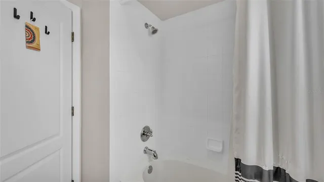 a view of a bathroom from a hallway