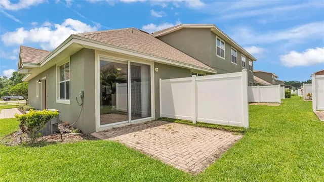 a house with garden in front of it