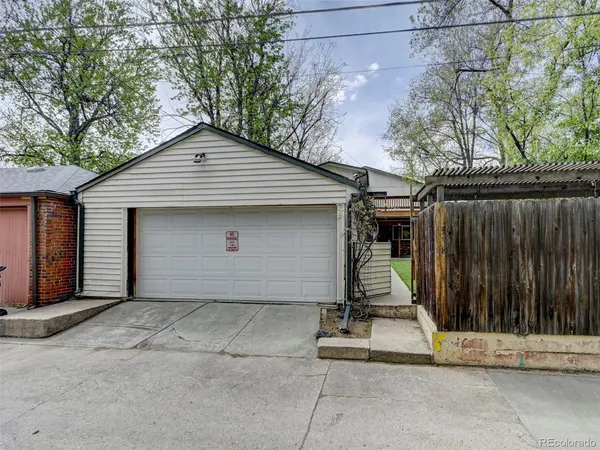 a front view of a house with a garage