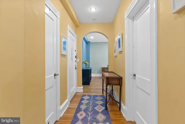 a view of a bathroom from a hallway