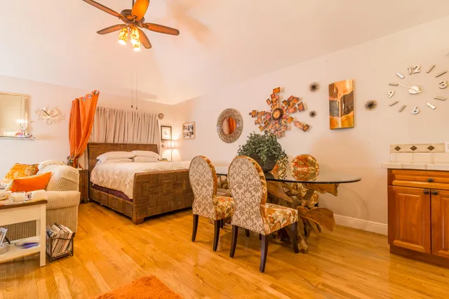 a view of swimming pool with outdoor seating