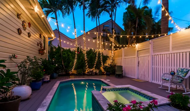 a living room filled with furniture and a fireplace