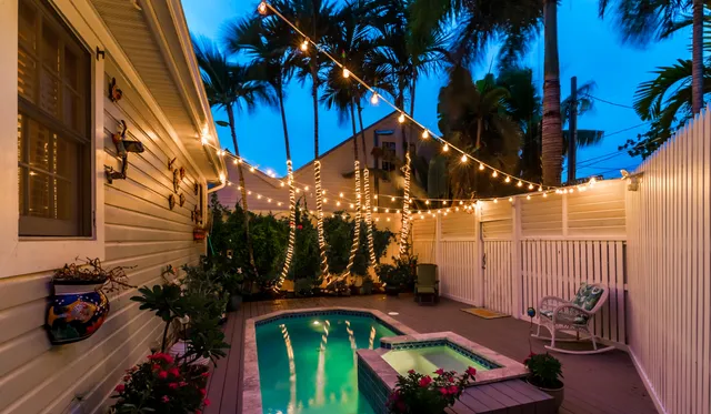 a view of a entryway of the house with potted plants