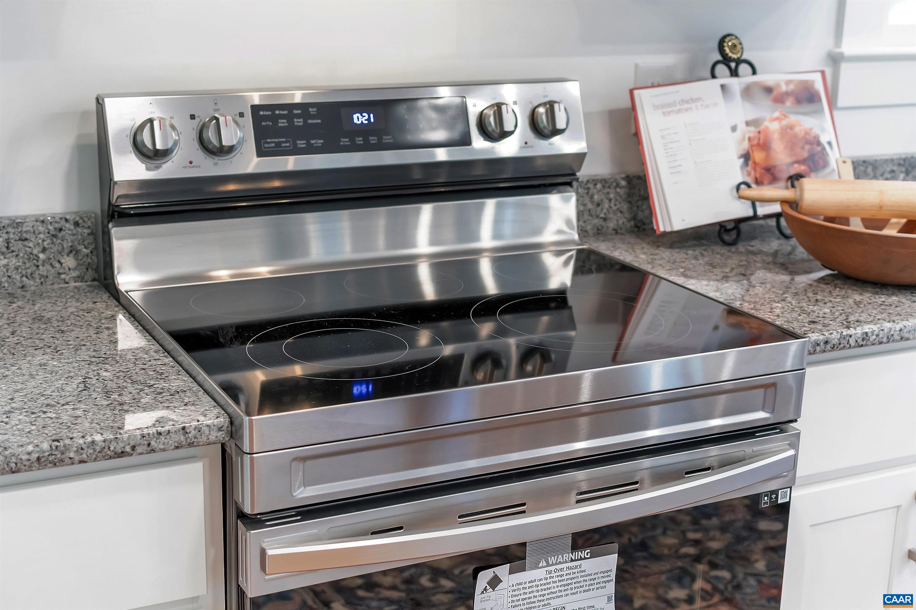 1820 Ridge Road Palmyra, VA 22963 - Photo 19 of 65 a stove top oven sitting inside of a kitchen