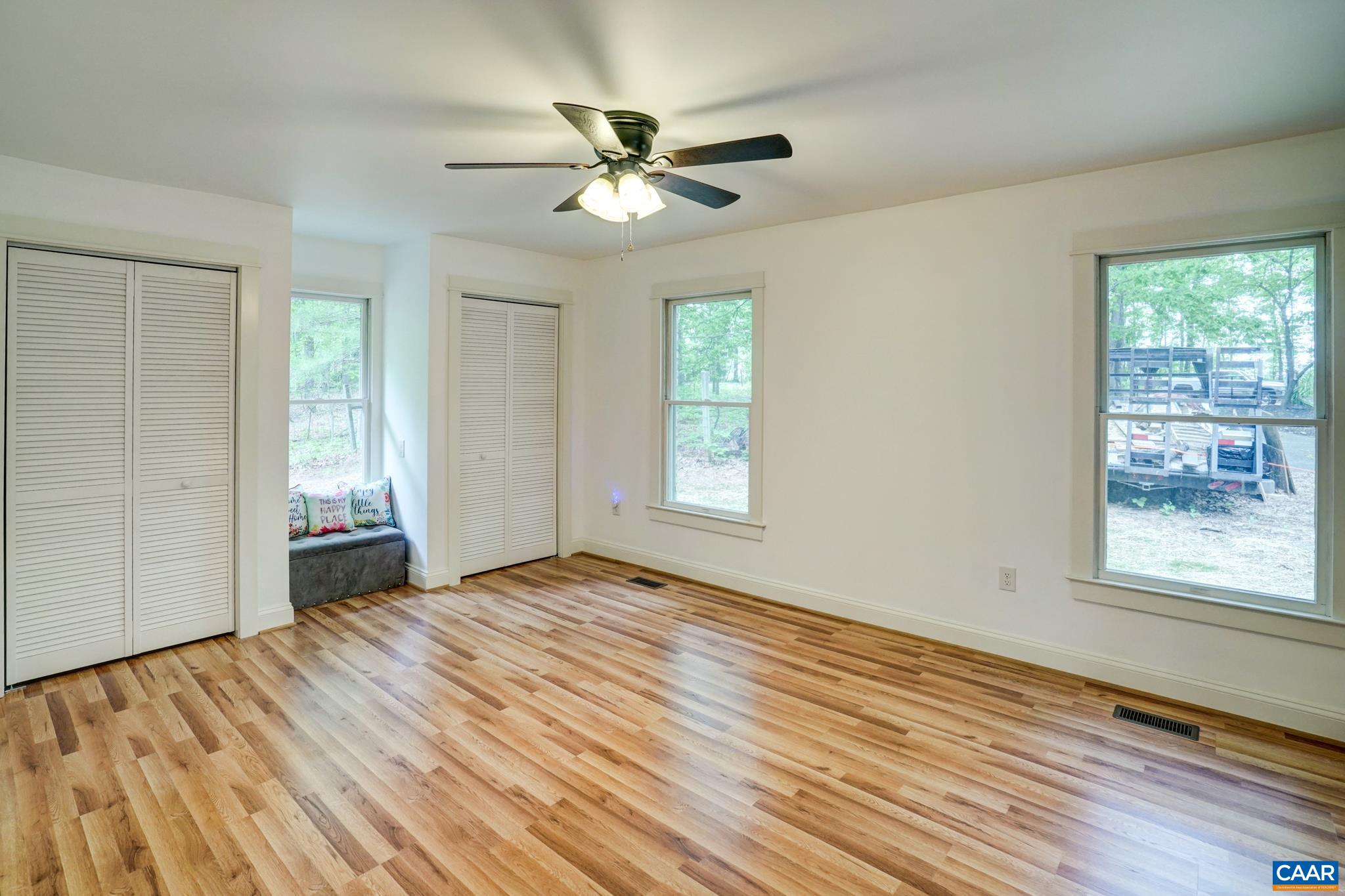 1820 Ridge Road Palmyra, VA 22963 - Photo 24 of 65 a view of an empty room with wooden floor and a window