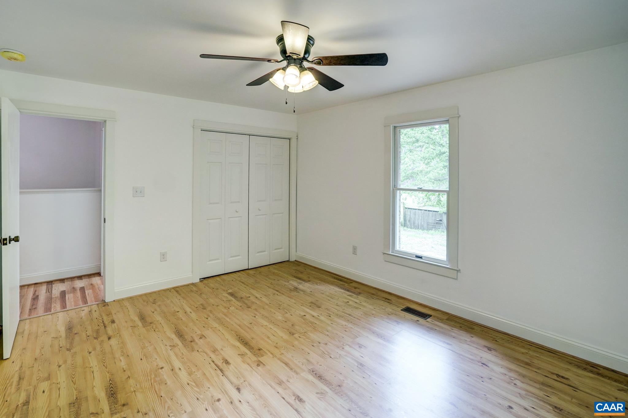 1820 Ridge Road Palmyra, VA 22963 - Photo 33 of 65 wooden floor in an empty room with a window