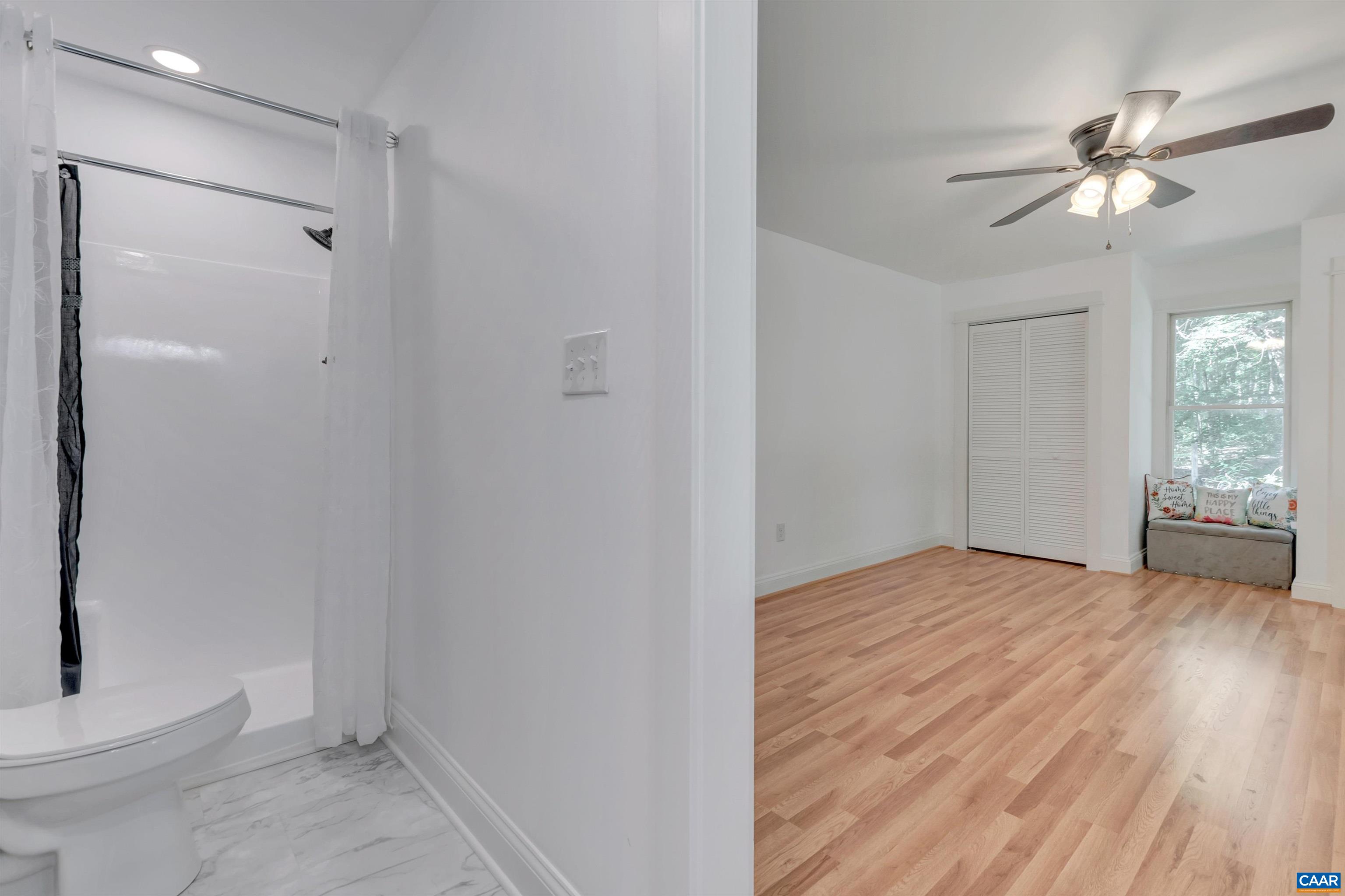 1820 Ridge Road Palmyra, VA 22963 - Photo 39 of 65 a view of an empty room with wooden floor and a window