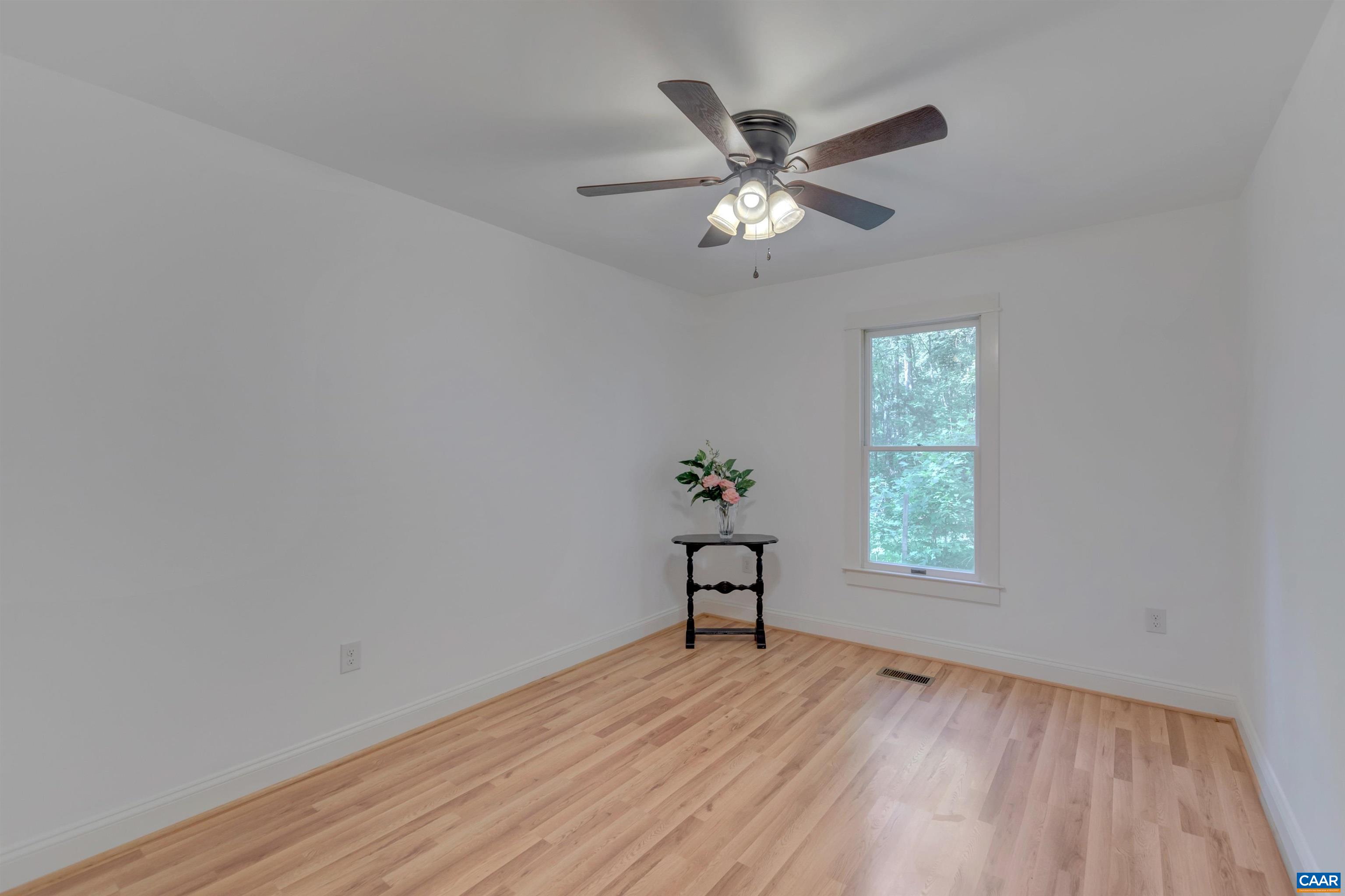 1820 Ridge Road Palmyra, VA 22963 - Photo 41 of 65 wooden floor in an empty room with a window
