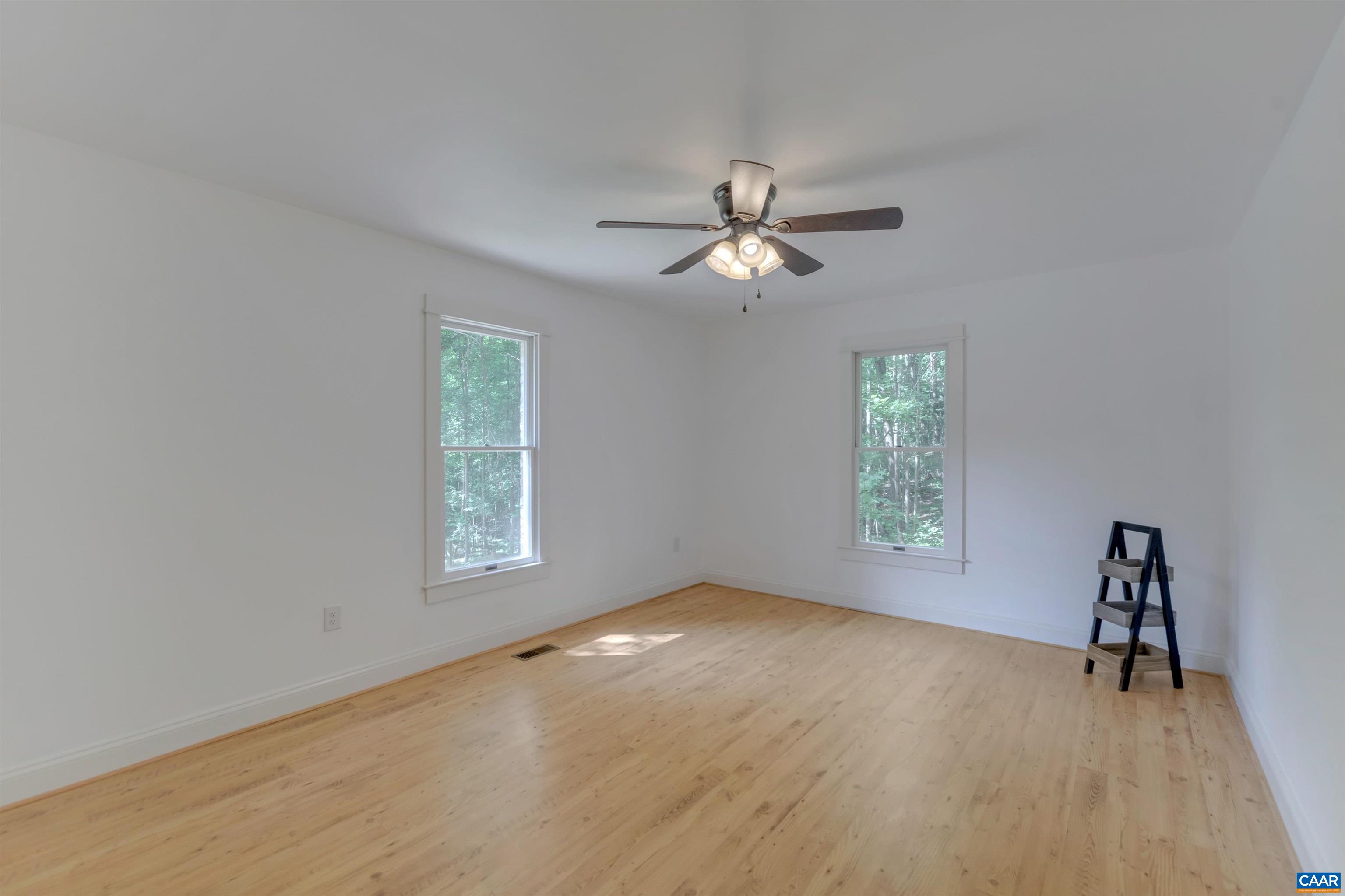 1820 Ridge Road Palmyra, VA 22963 - Photo 42 of 65 a view of empty room with window and ceiling fan
