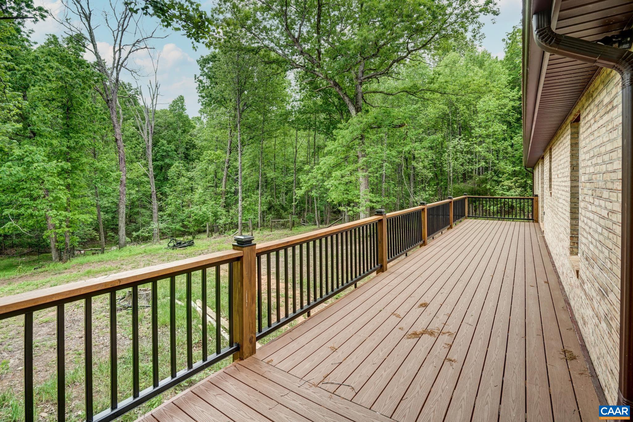 1820 Ridge Road Palmyra, VA 22963 - Photo 50 of 65 a view of balcony with wooden floor and fence