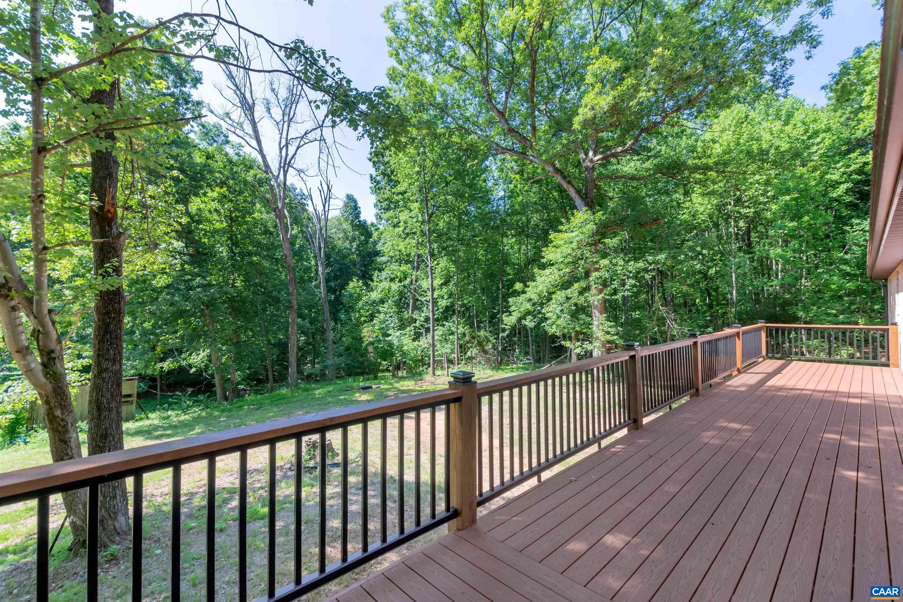 1820 Ridge Road Palmyra, VA 22963 - Photo 55 of 65 a view of balcony with deck and trees
