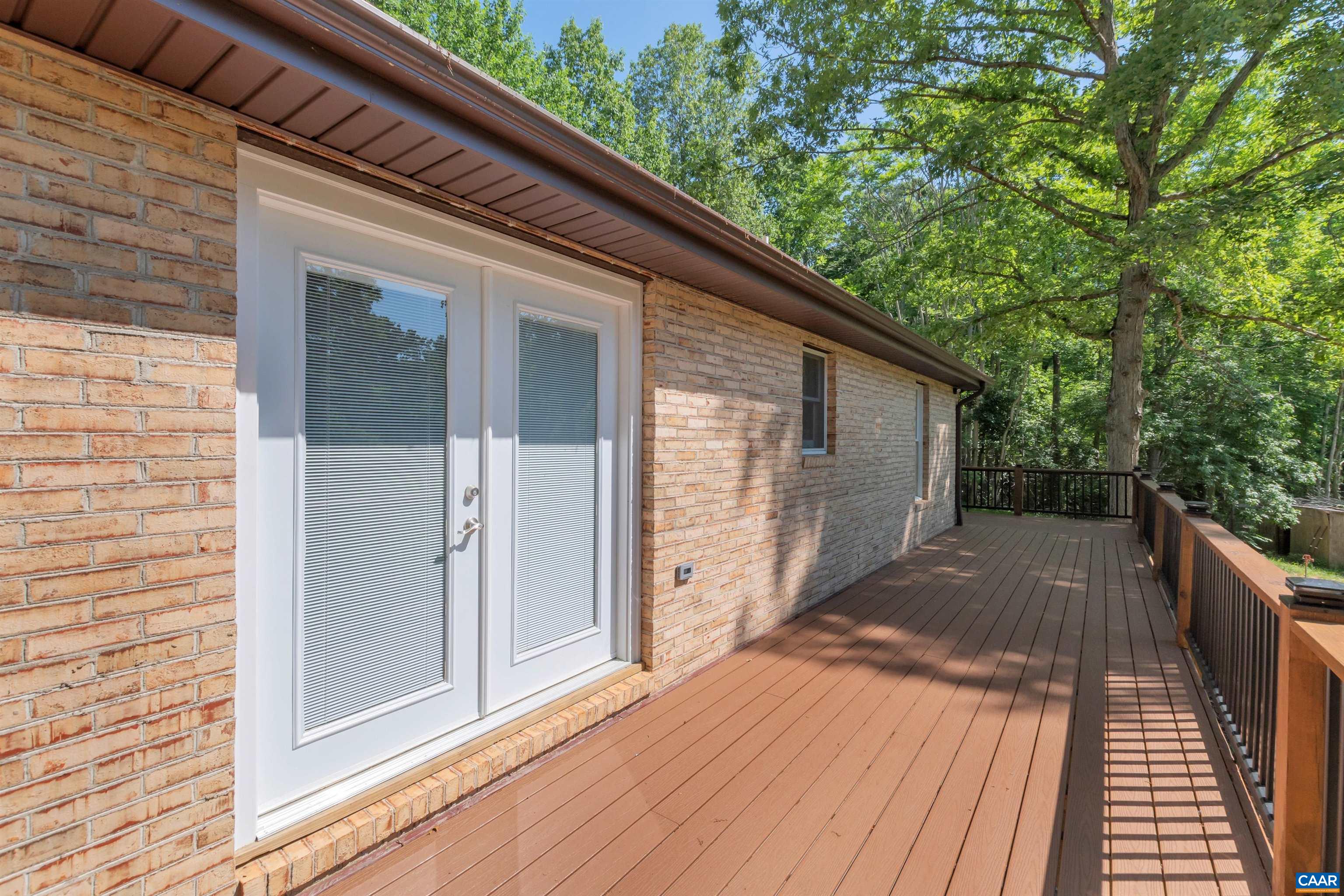 1820 Ridge Road Palmyra, VA 22963 - Photo 57 of 65 a view of backyard with a deck and wooden floor