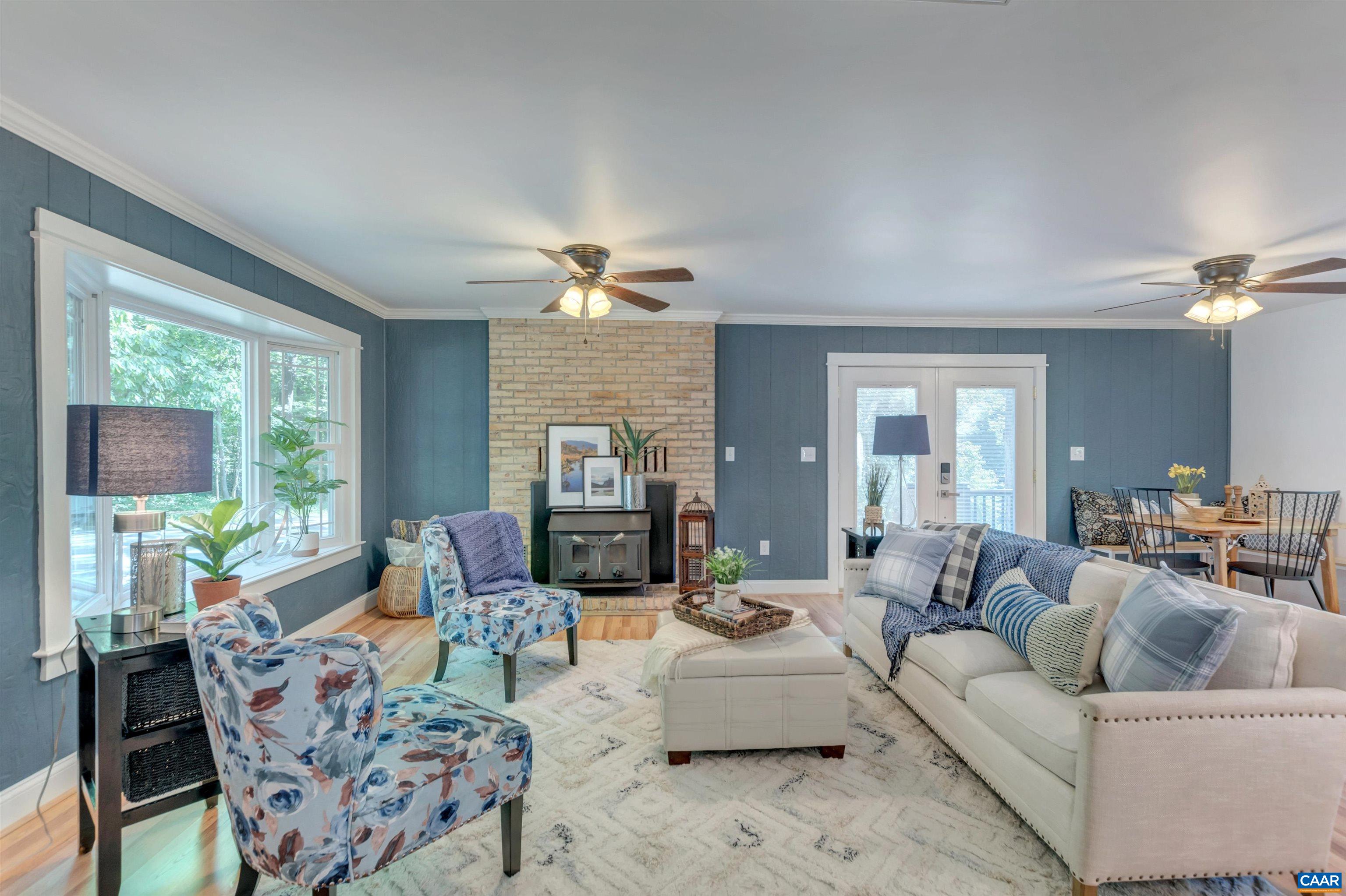 1820 Ridge Road Palmyra, VA 22963 - Photo 8 of 65 a living room with furniture and a fireplace