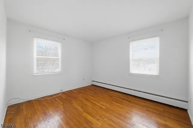 a view of a room that has a window in it
