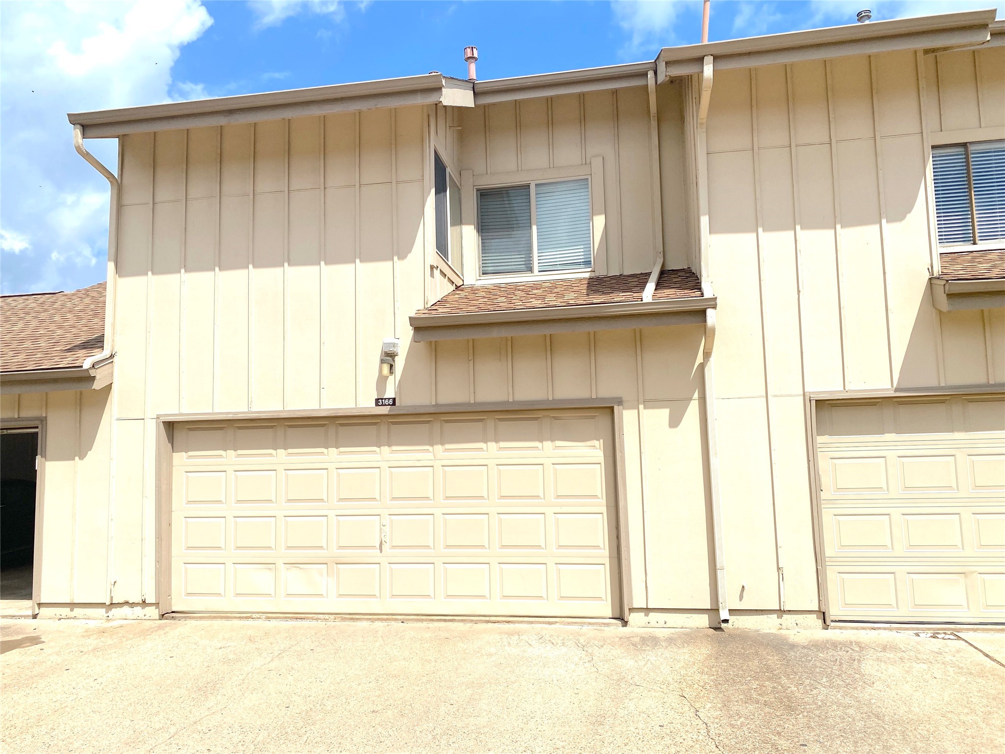 3166 Windchase Boulevard, Unit 465 Houston, TX 77082 - Photo 17 of 21 a view of a door front of a house