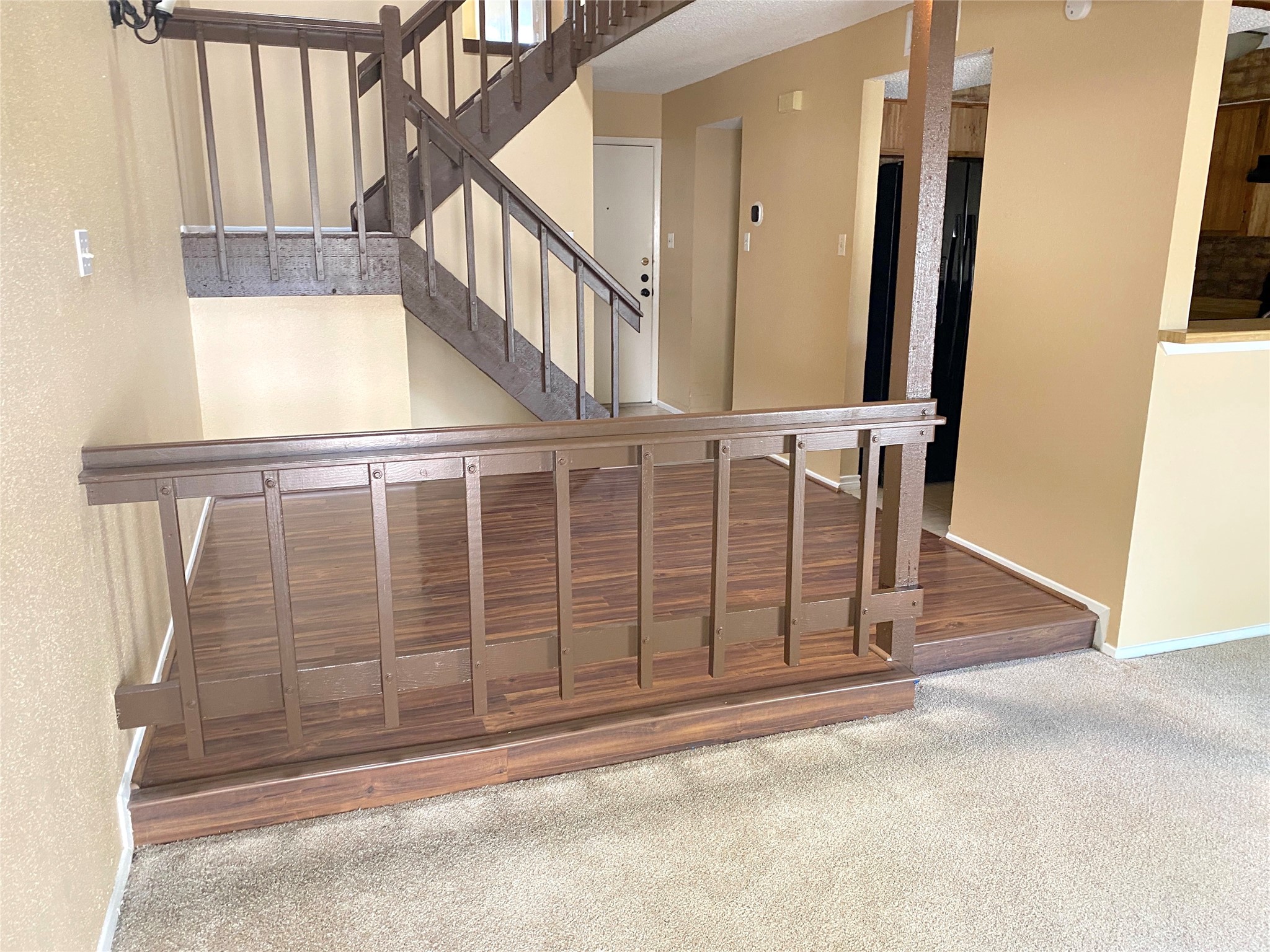 3166 Windchase Boulevard, Unit 465 Houston, TX 77082 - Photo 6 of 21 a view of entryway with wooden door