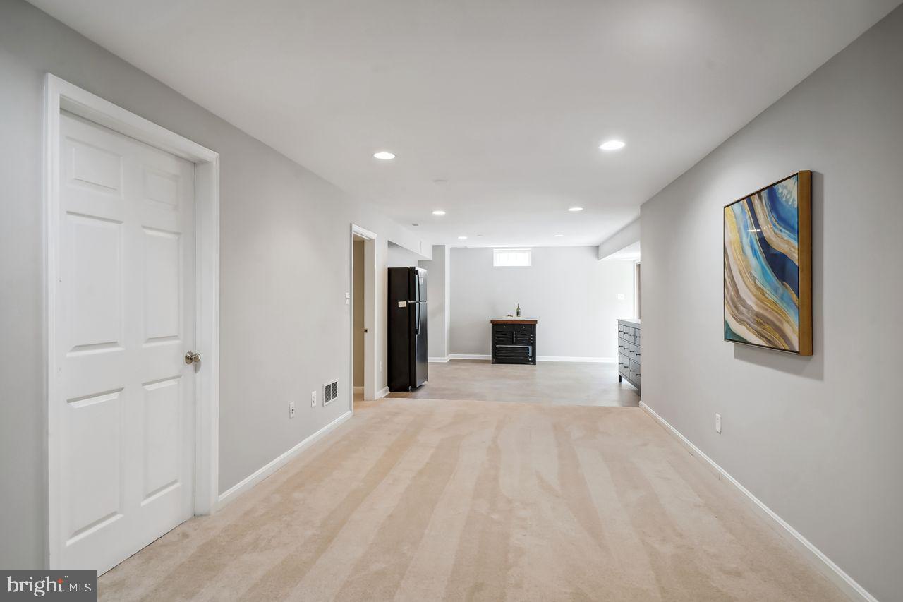 1757 Brookshire Run Point of Rocks, MD 21777 - Photo 29 of 54 Recreation room in basement w/ walk-up to backyard