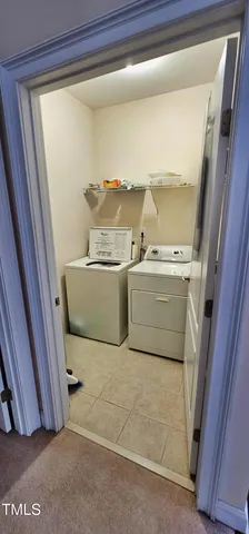 a bedroom with a bed and dresser