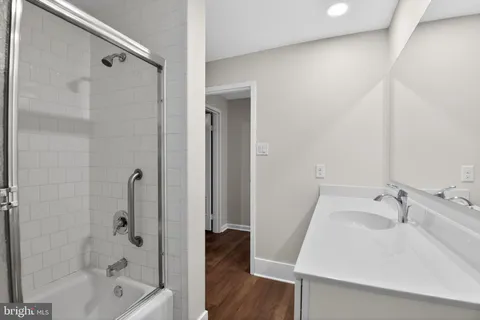a bathroom with a sink and a bathtub