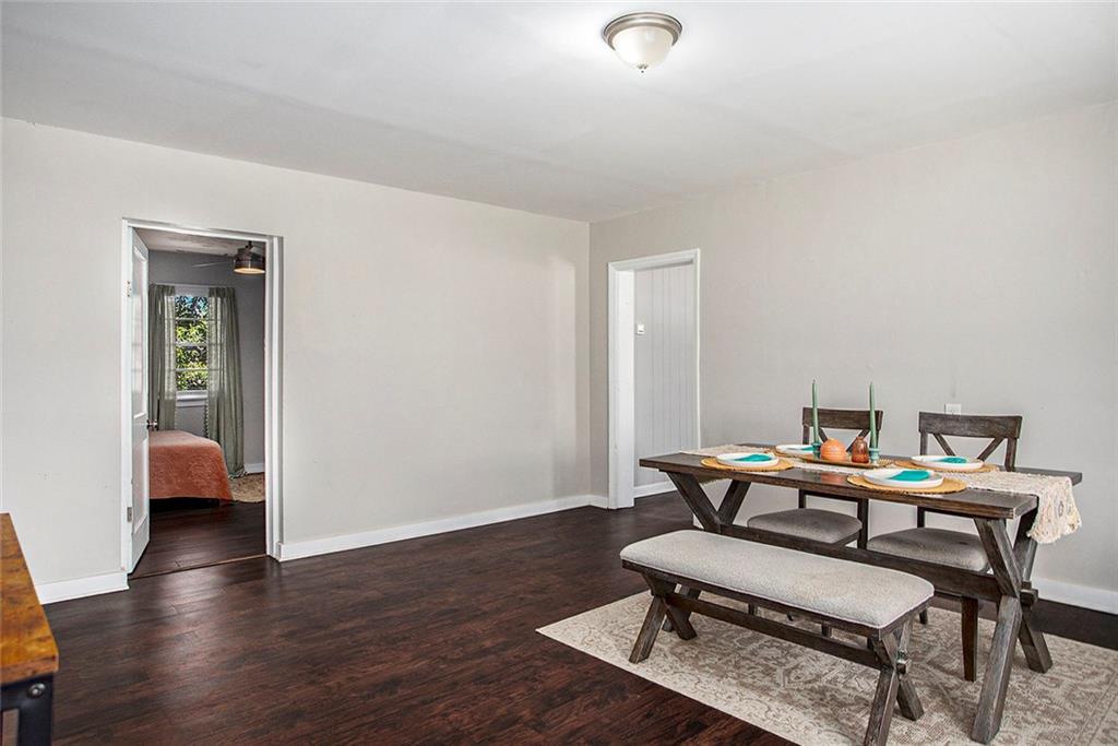 1298 Irwin Bridge Road Northwest Conyers, GA 30012 - Photo 13 of 25 a room with furniture and wooden floor