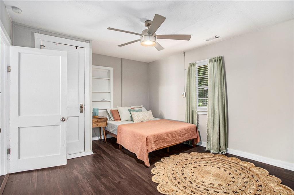 1298 Irwin Bridge Road Northwest Conyers, GA 30012 - Photo 16 of 25 a bedroom with a bed and a window