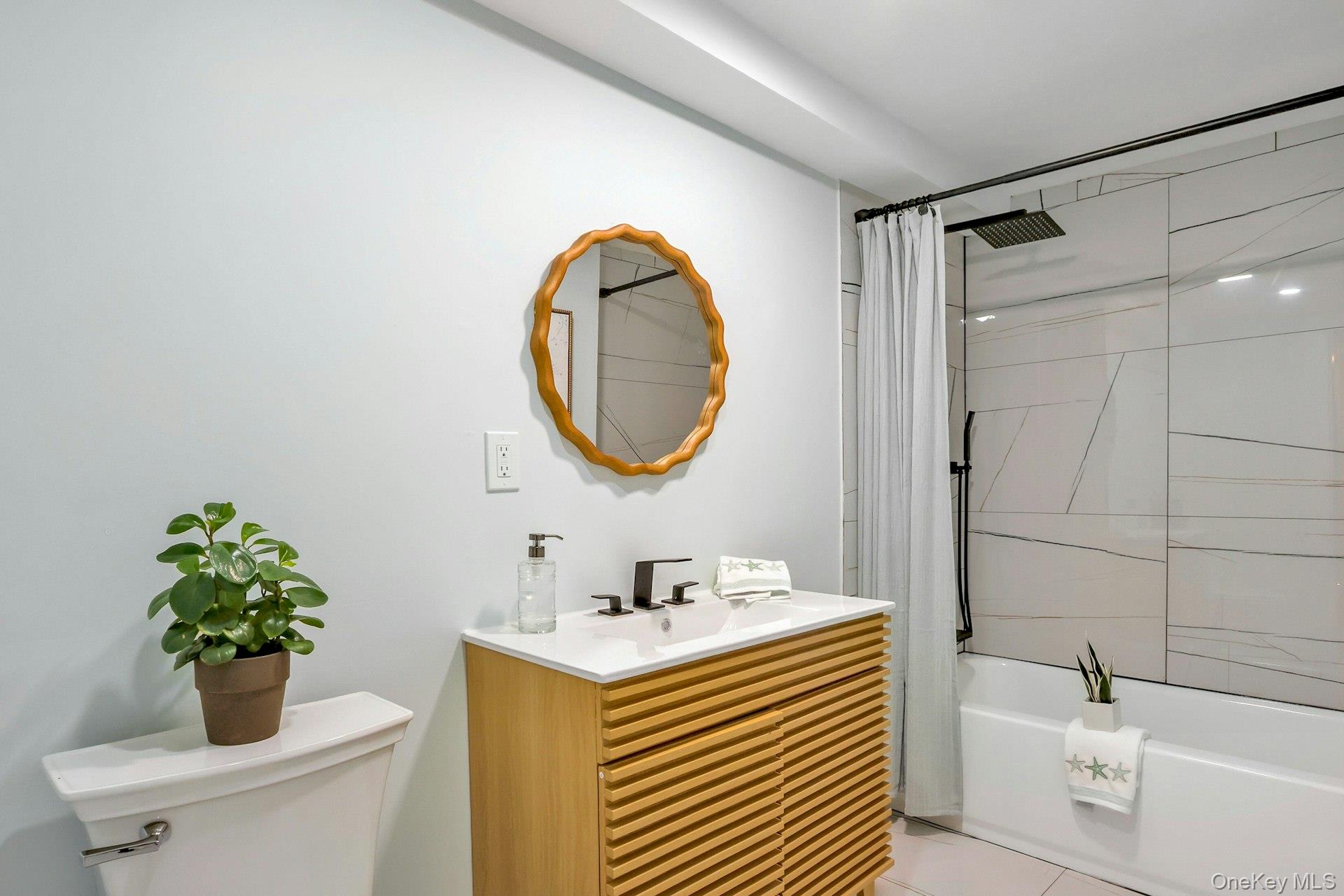 171 Chambers Street Newburgh, NY 12550 - Photo 16 of 39 a bathroom with a sink mirror and toilet