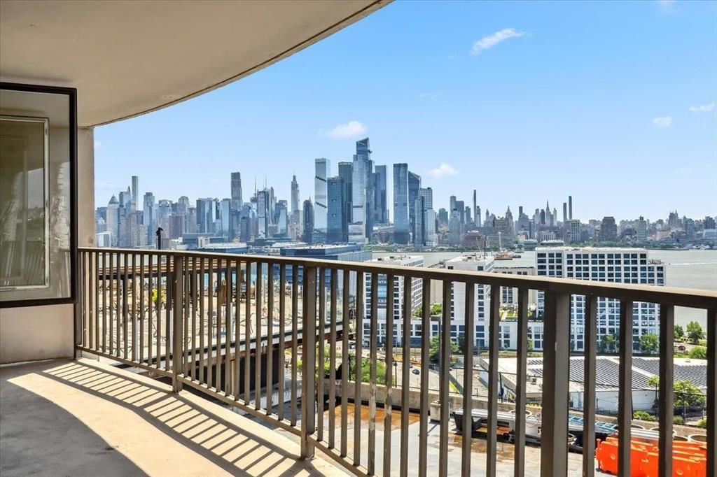 380 Mountain Road, Unit 213 Union City, NJ 07087 - Photo 20 of 24 a view of city from a balcony
