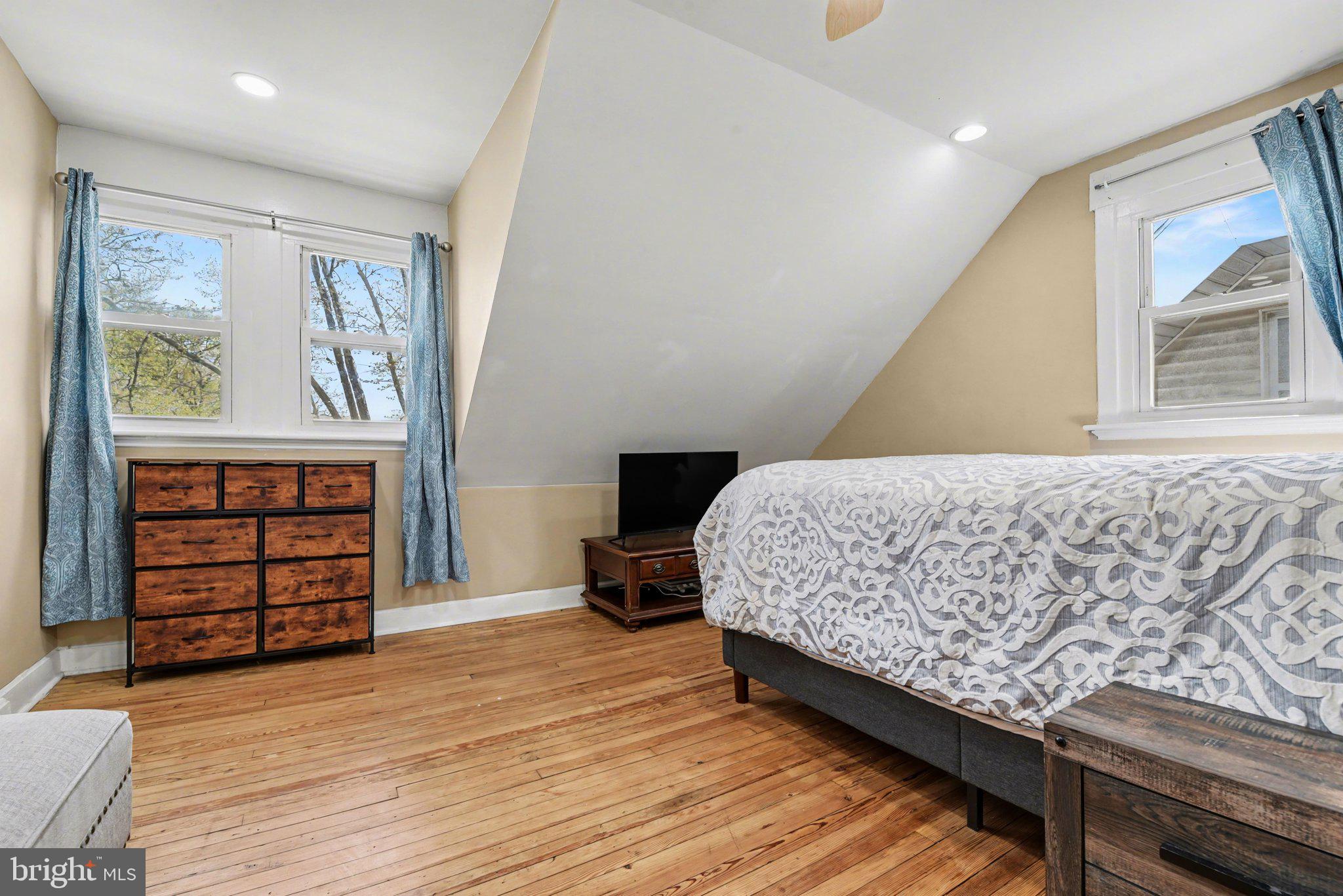918 North 16th Street Harrisburg, PA 17103 - Photo 20 of 31 a bedroom with a bed and a dresser