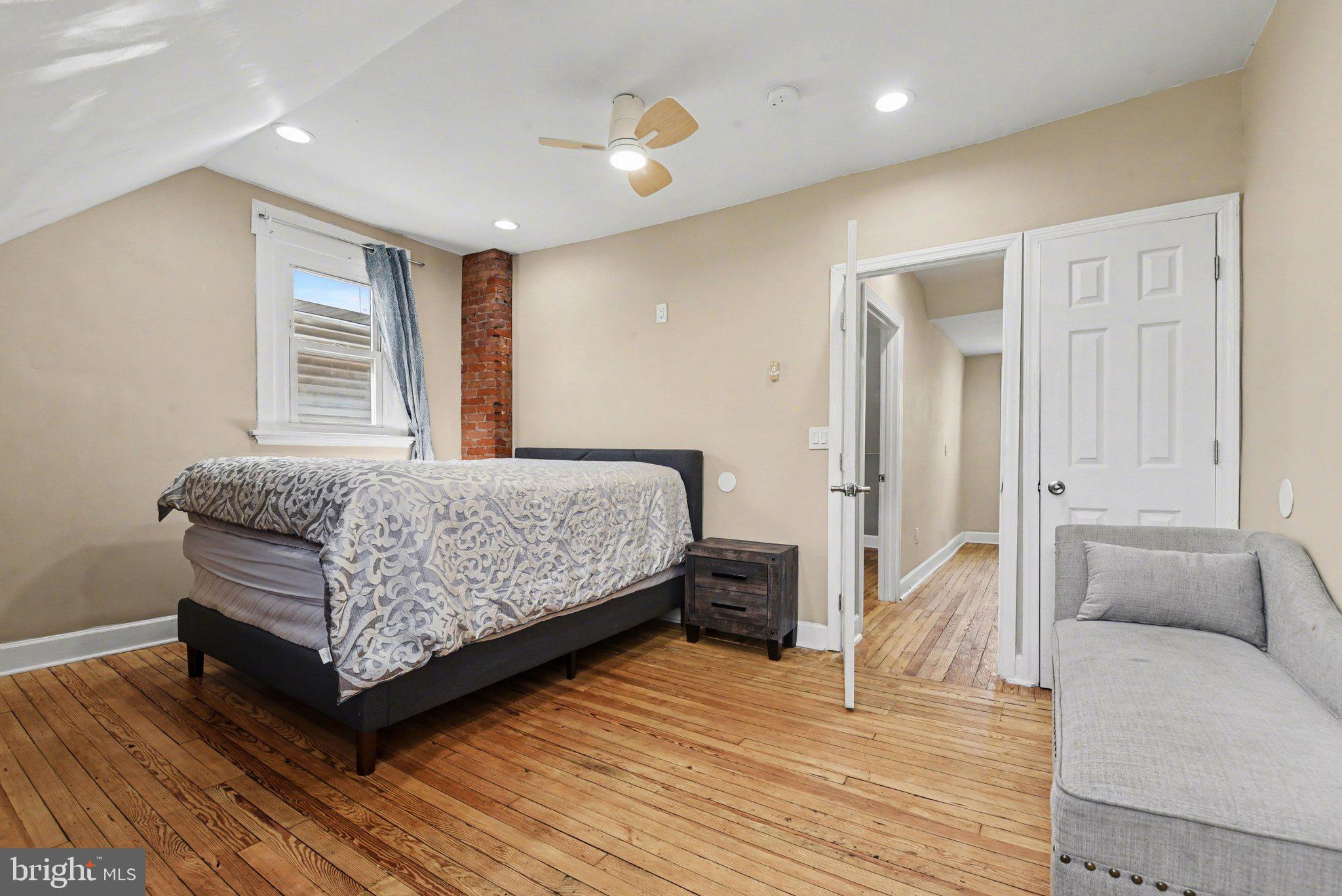 918 North 16th Street Harrisburg, PA 17103 - Photo 21 of 31 a bedroom with a bed and window