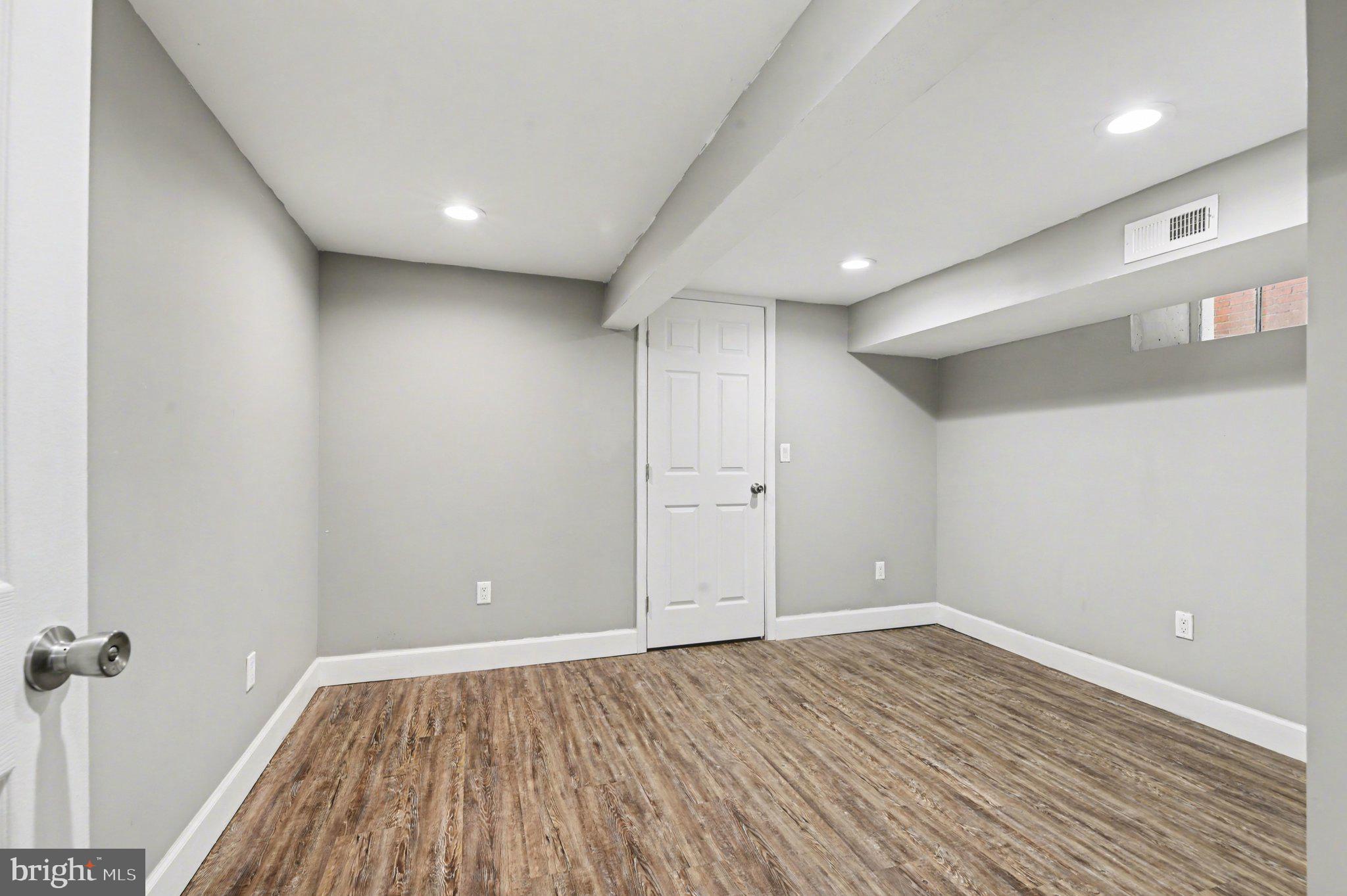 918 North 16th Street Harrisburg, PA 17103 - Photo 24 of 31 a view of a room with wooden floor