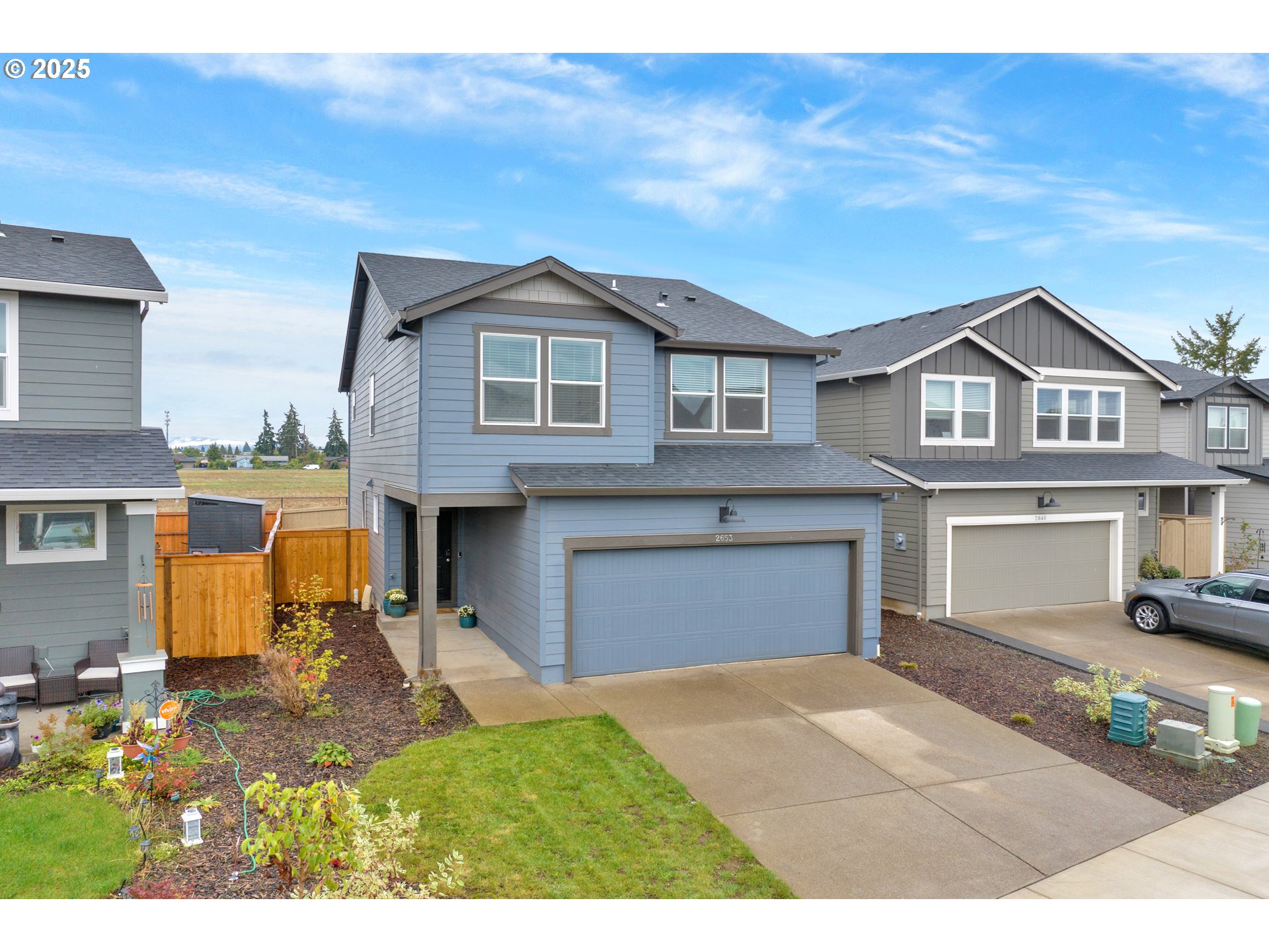 2653 U Street Springfield, OR 97477 - Photo 2 of 32 a front view of a house with a yard