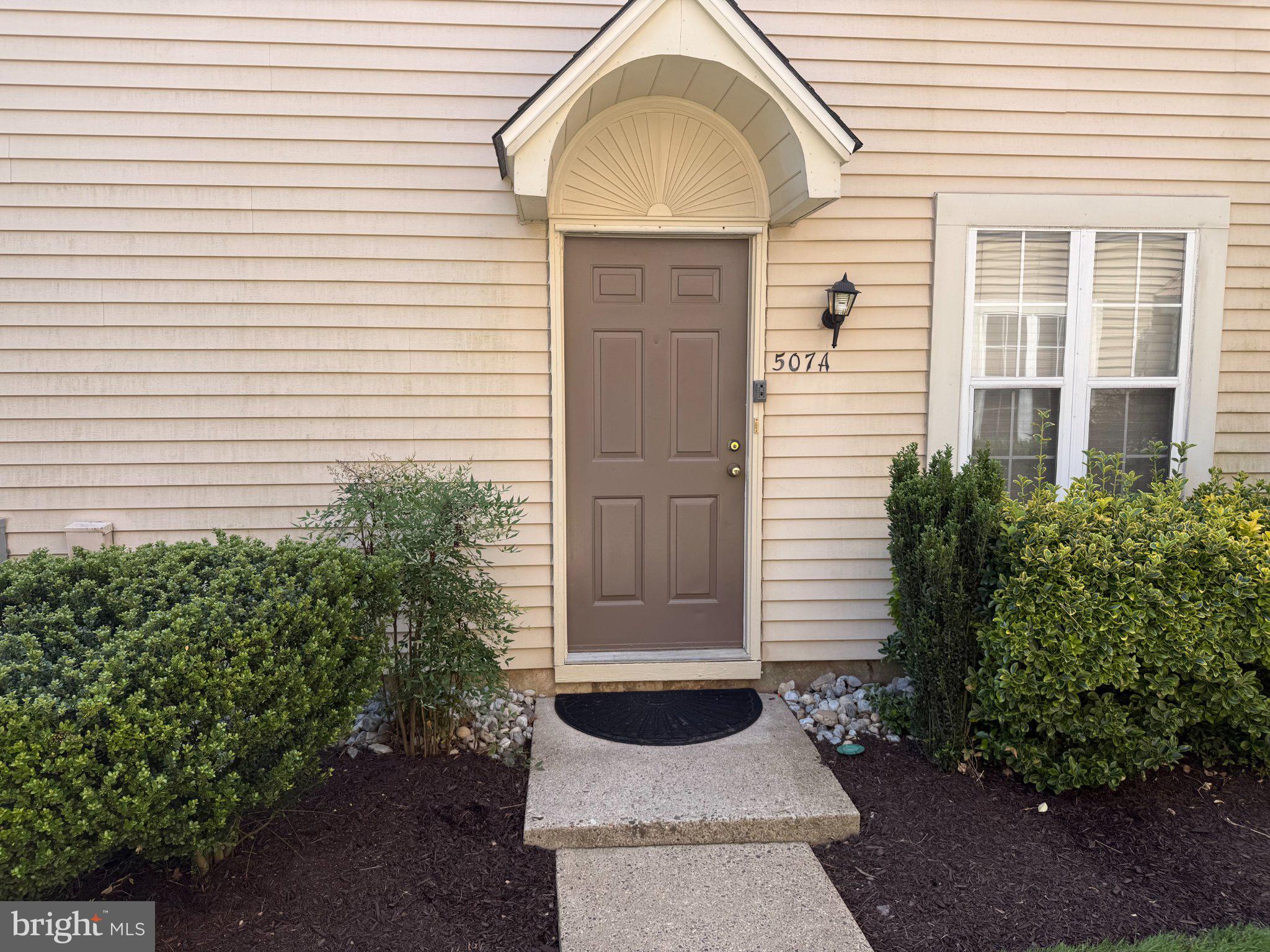 507 A Ralston Drive Mount Laurel, NJ 08054 - Photo 5 of 11 Charming entrance with lush greenery.