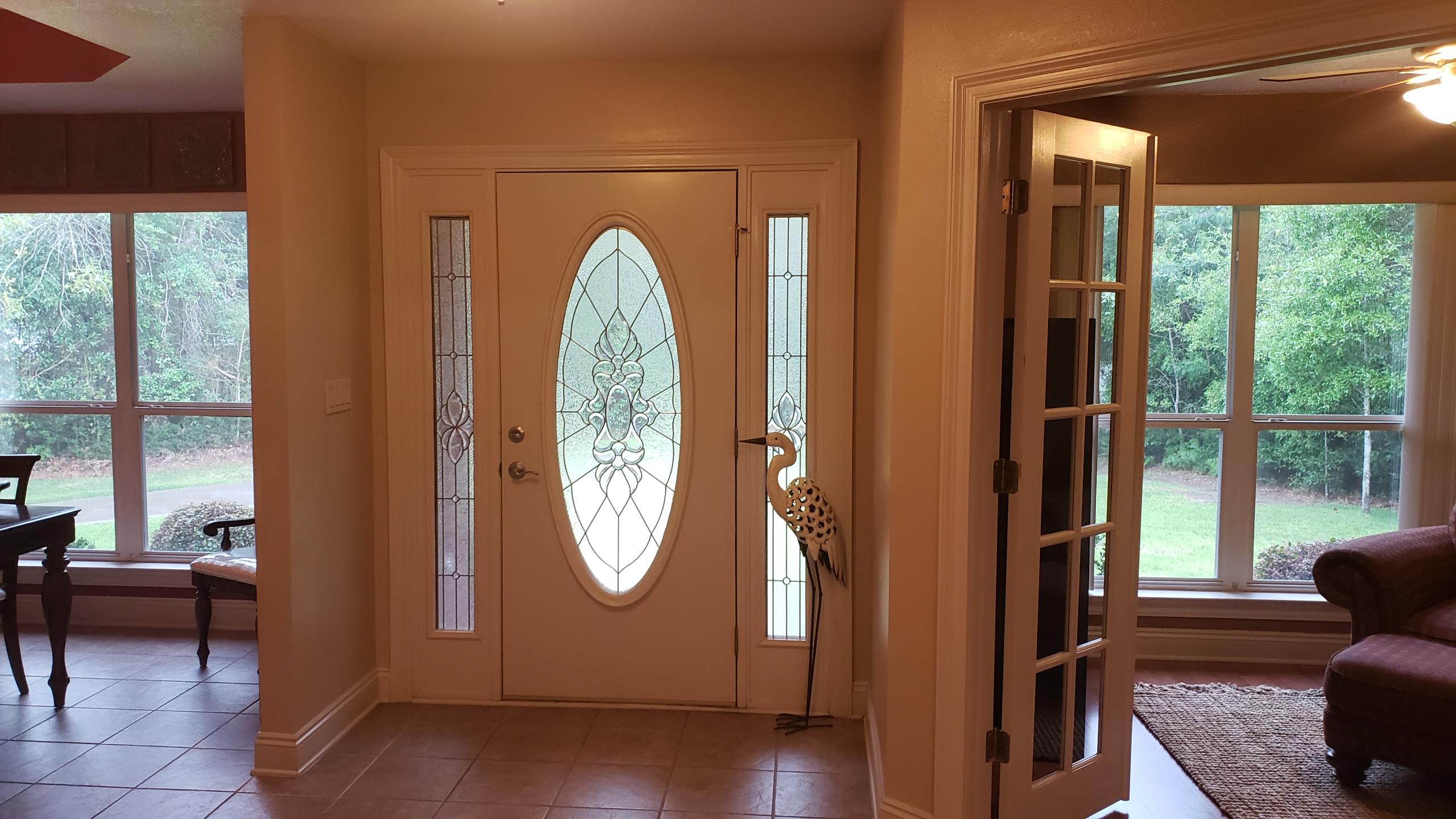 591 Ridge Lake Road Crestview, FL 32536 - Photo 14 of 31 a view of living room with furniture and a window