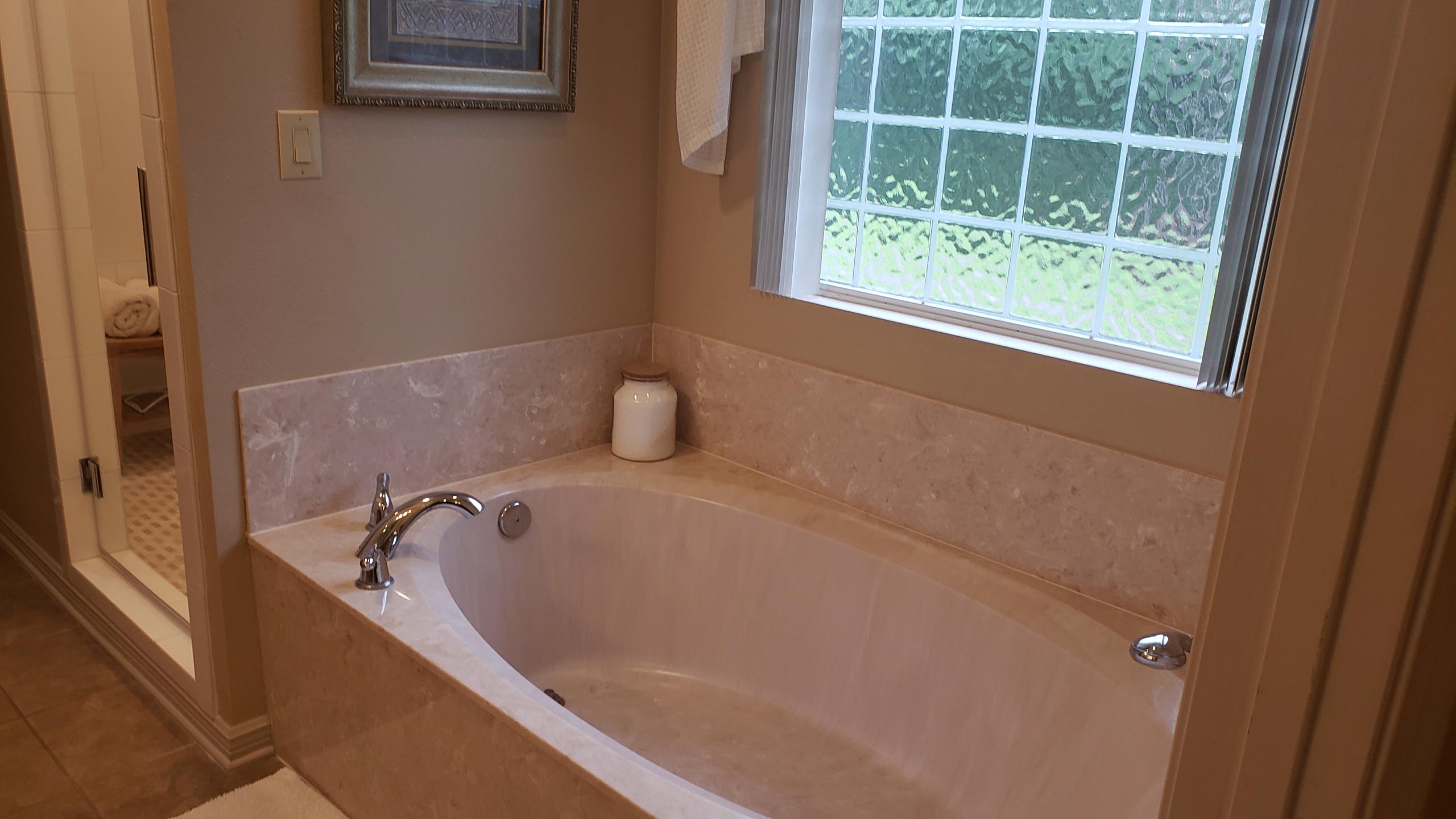 591 Ridge Lake Road Crestview, FL 32536 - Photo 23 of 31 a bathroom with a bathtub