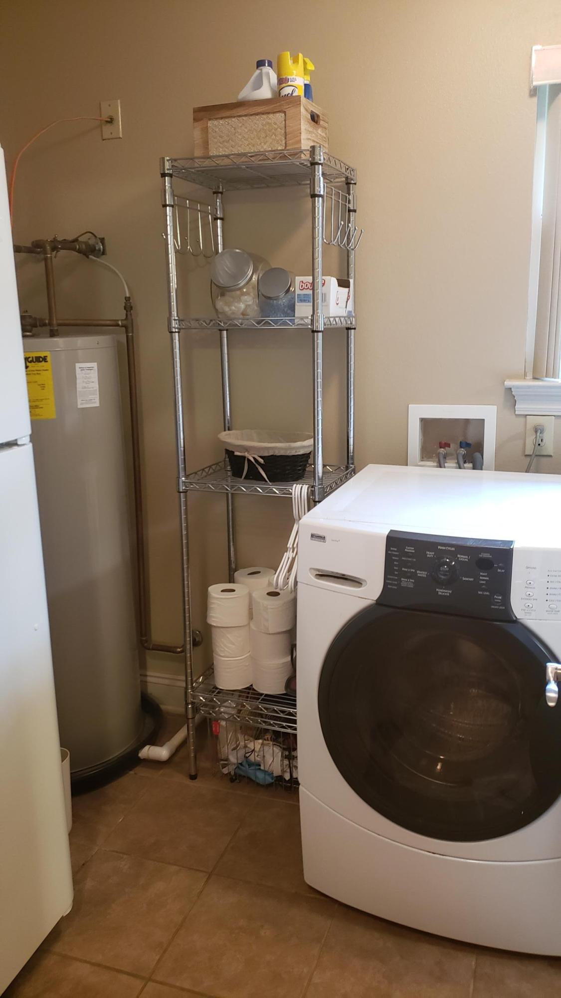 591 Ridge Lake Road Crestview, FL 32536 - Photo 29 of 31 a utility room with a sink dryer and washer