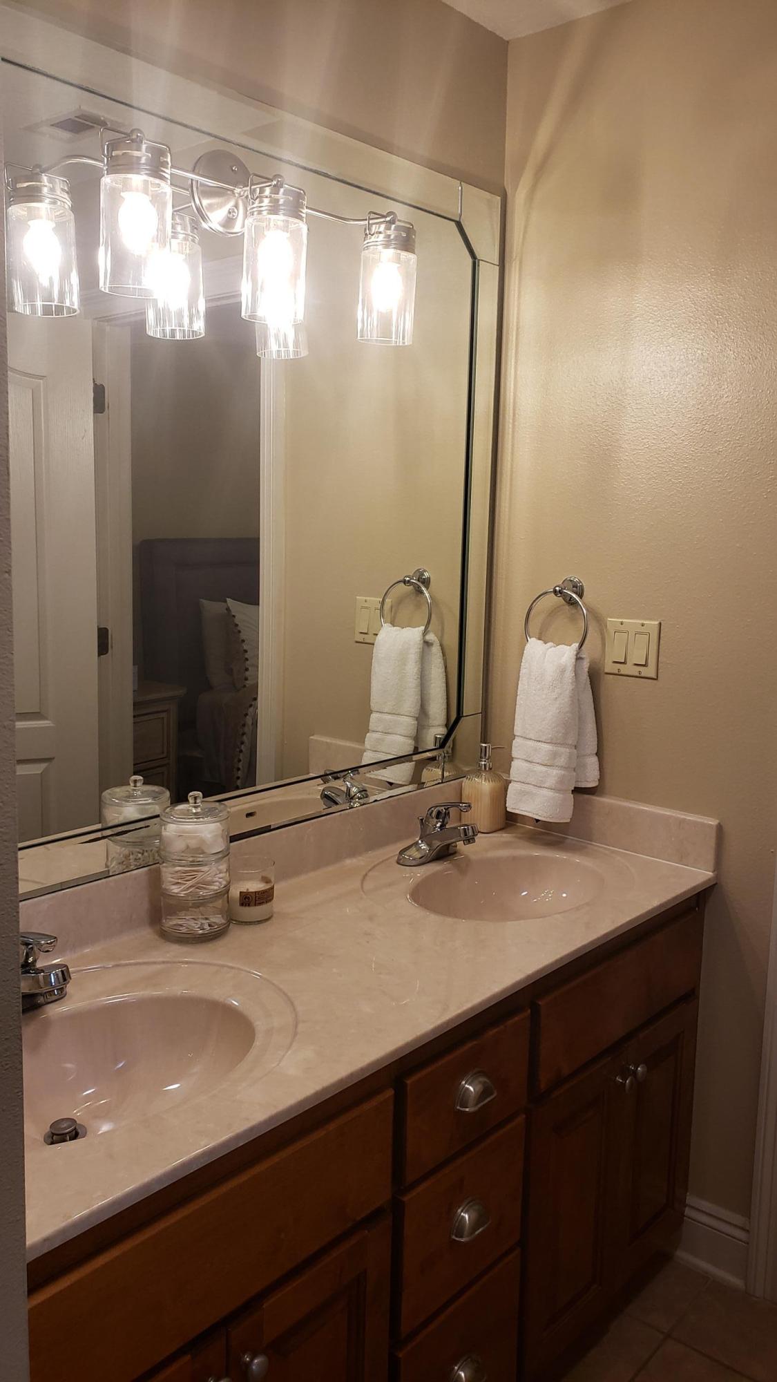 591 Ridge Lake Road Crestview, FL 32536 - Photo 8 of 31 a bathroom with a sink and mirror