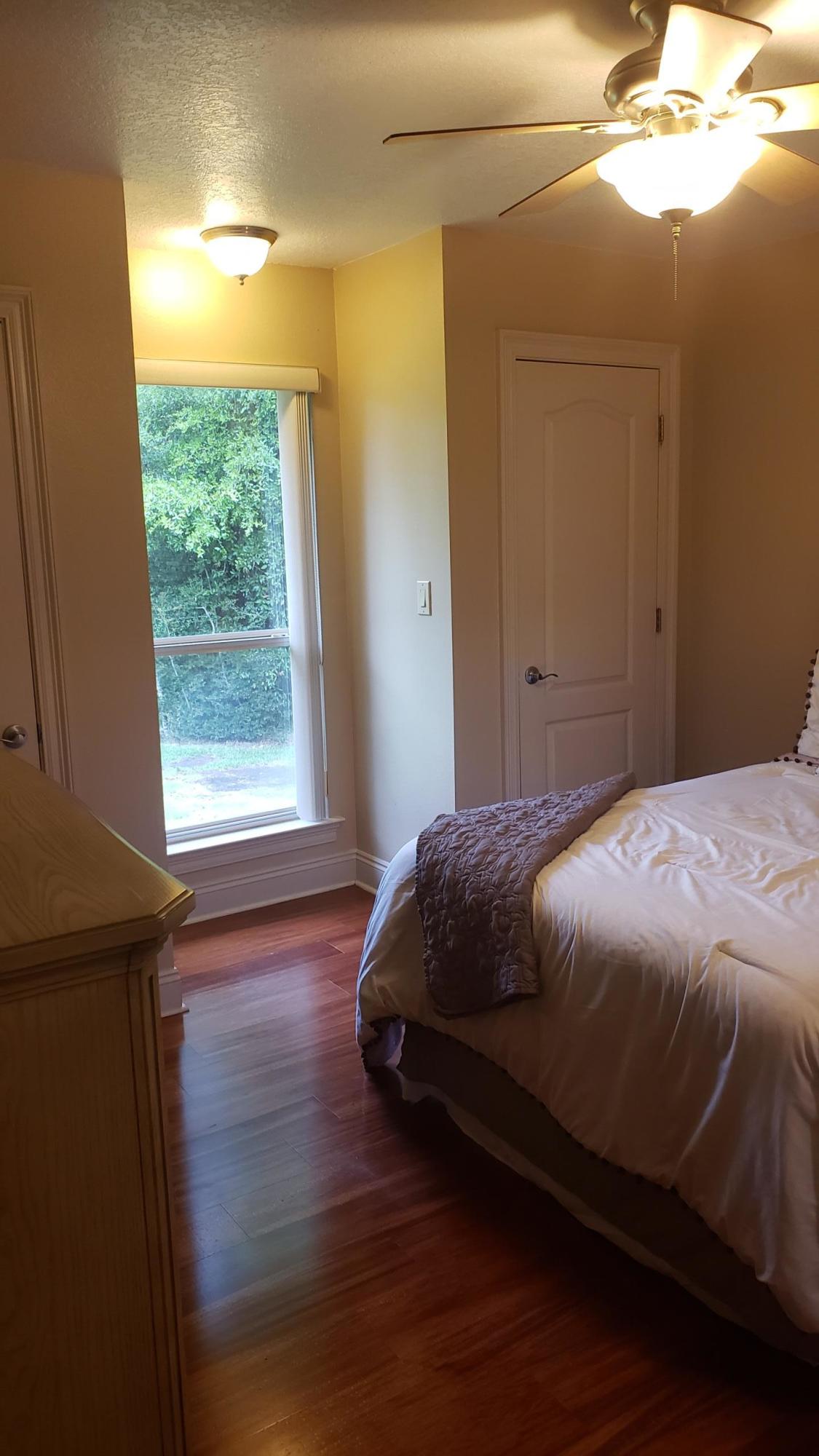 591 Ridge Lake Road Crestview, FL 32536 - Photo 10 of 31 a bedroom with a bed and a window